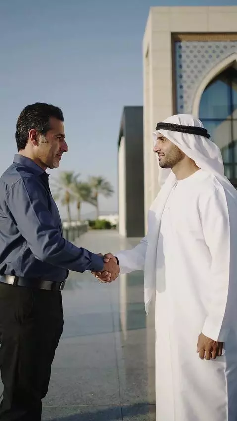 AI Video from prompt: generate how an Iranian and an Emirati shake han