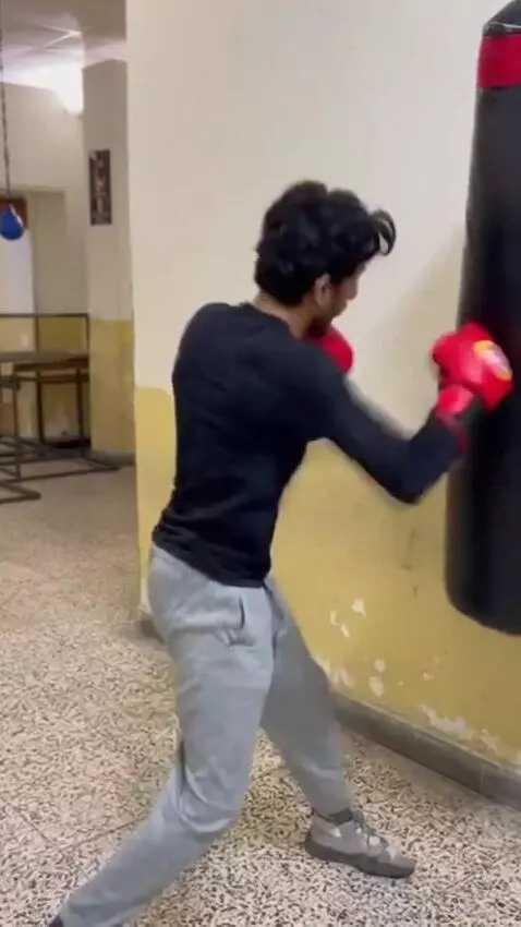 AI Video from prompt: practicing boxing