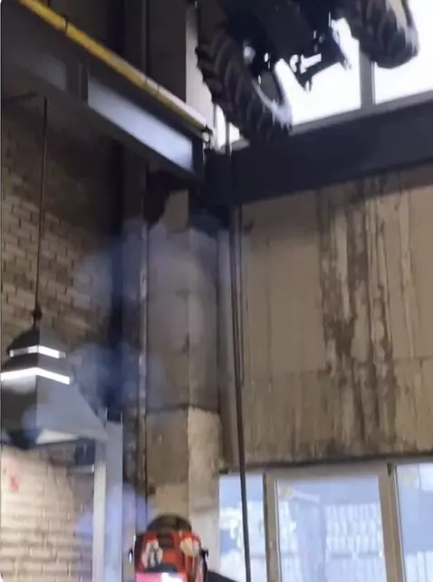 AI Video from prompt: A tractor falls from above