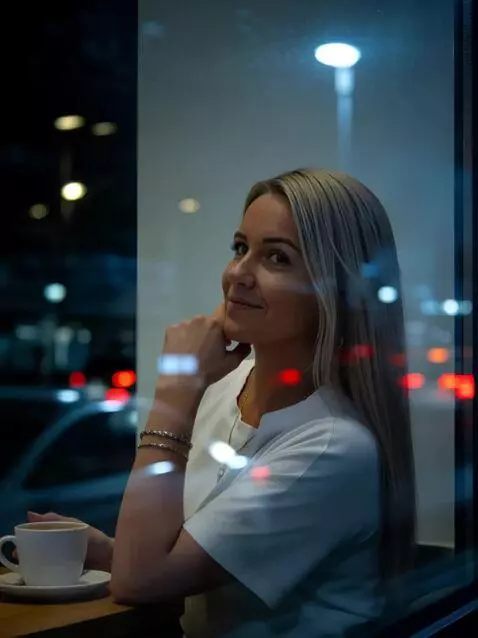 AI Video from prompt: A girl drinking coffee is a romantic setting, th