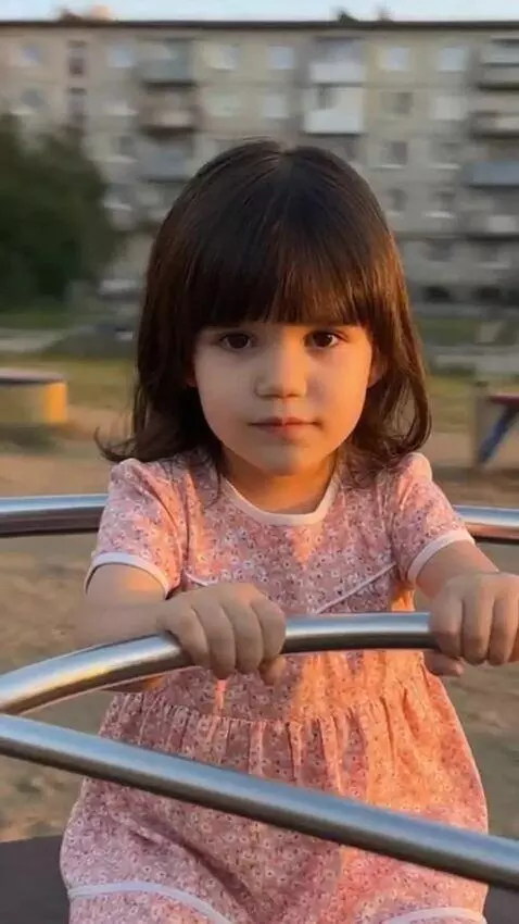 AI Video from prompt: Create a looping video featuring a girl sitting 