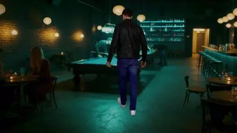 AI Video from prompt: the camera is not moving. a man in blue jeans, a