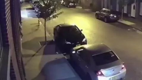 AI Video from prompt: grainy CCTV security camera footage, night stree