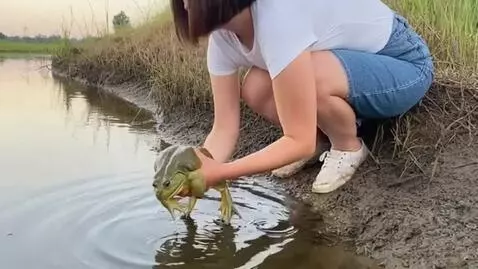 AI Video from prompt: a girl is squatting in a skirt takes a large gol