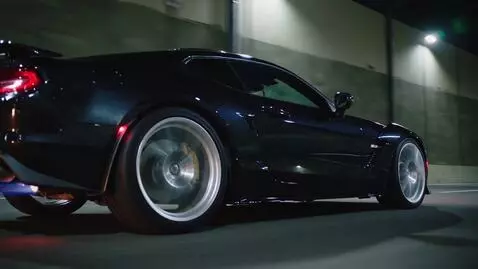 AI Video from prompt: The supercar enters a tunnel and accelerates pow