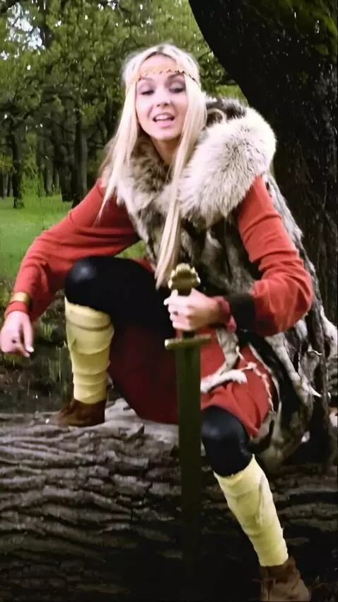 AI Video from prompt: The girl gets from the log and explains  somethi