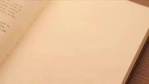 AI Video from prompt: the starting page turns to the next, the book ly