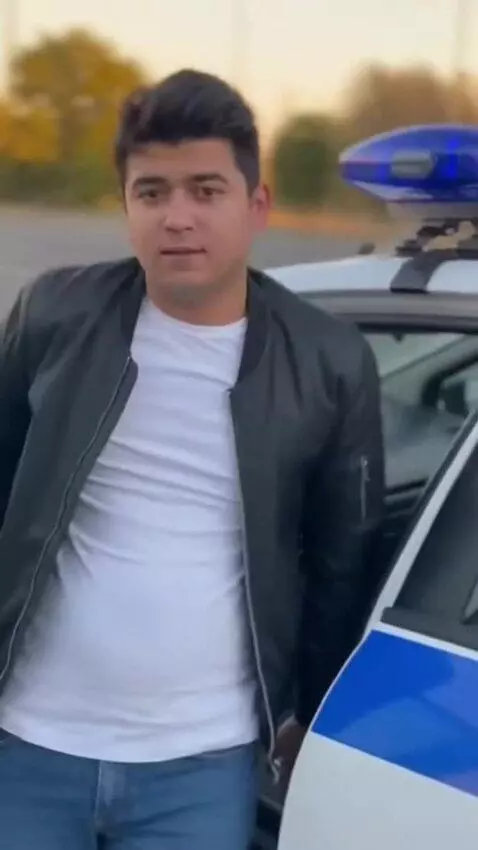 AI Video from prompt: A realistic cinematic scene. A young man gets ou