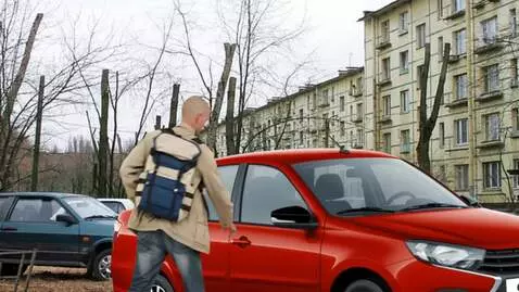 AI Video from prompt: a man opens the trunk of a car