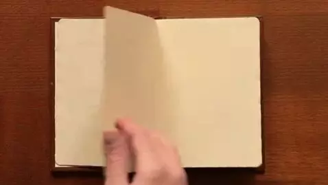 AI Video from prompt: flipping through 2 blank pages
