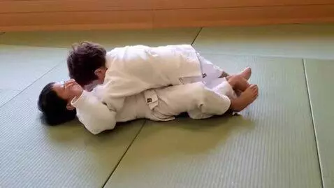 AI Video from prompt: two boys at six years,wearing white judo jackets
