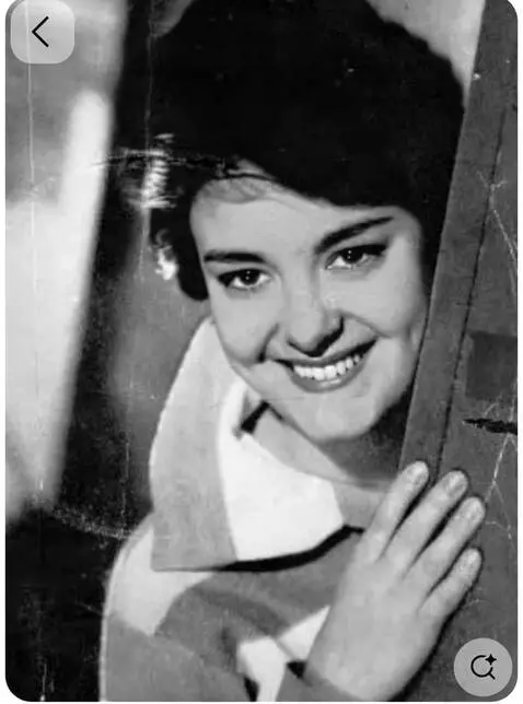 AI Video from prompt: A fifty-year-old snow queen kisses a young man o