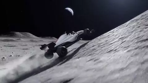 AI Video from prompt: A glossy white F1 car roaring up the jagged emba