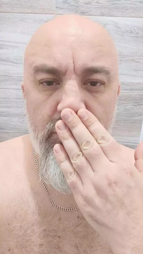 AI Video from prompt: Keep the proportions and facial features. The ma