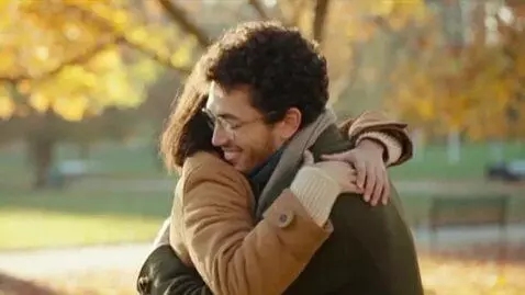 AI Video from prompt: A breast kiss