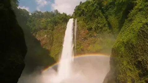 AI Video from prompt: Fast-paced montage of the island: crashing waves