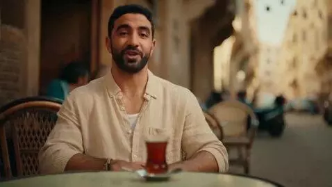 AI Video from prompt: The same Egyptian man from the previous scene, s