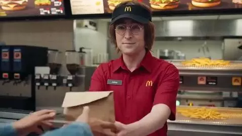 AI Video from prompt: john lennon works at mcdonald's.