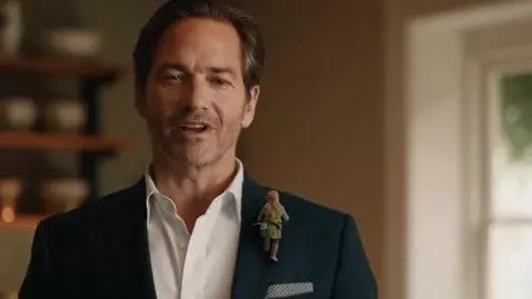 AI Video from prompt: Man with dark hair and rugged nose wearing a sui