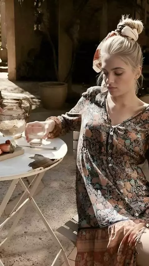 AI Video from prompt: A girl in a skirt a takes a glass of water from 