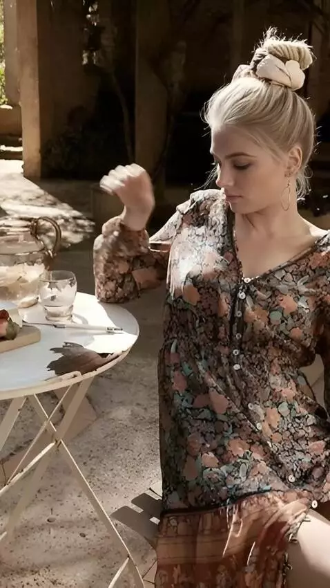 AI Video from prompt: drinks itA woman in a skirt  pours water from a 