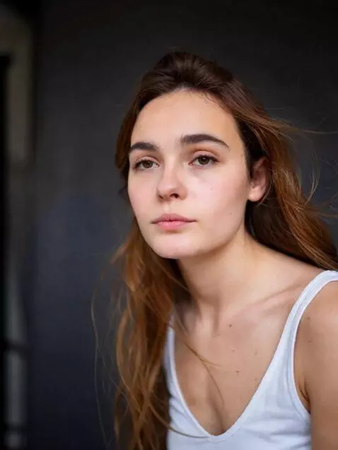 AI Video from prompt: barely turns his head and looks straight at the 