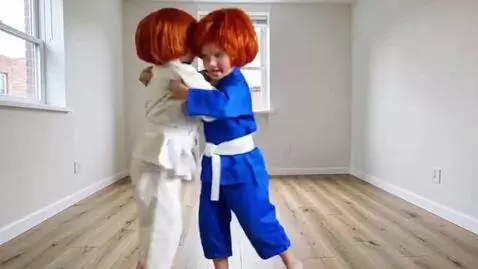 AI Video from prompt: two boys in judogi,grappling and roll over each 