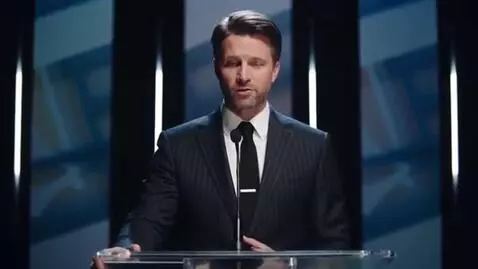 AI Video from prompt: "A serious businessman giving a speech suddenly 