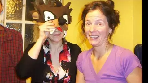 AI Video from prompt: Take off the mask and kiss the other woman