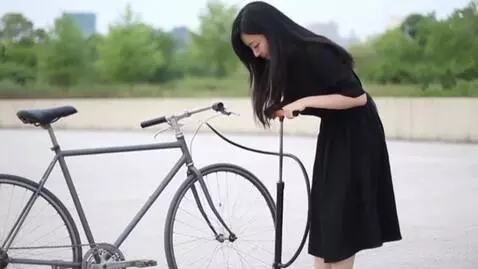 AI Video from prompt: An Asian girl with flowing black hair, a G-cup b