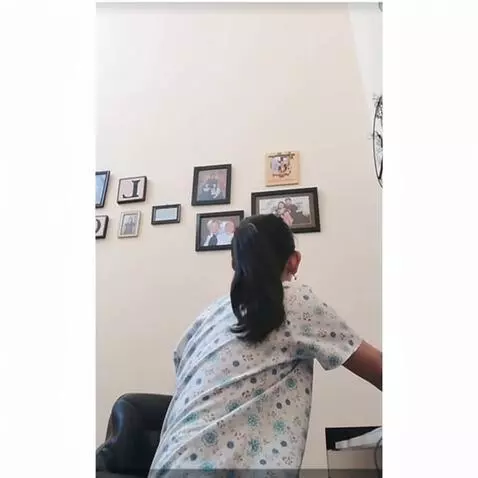 AI Video from prompt: Make the lady on the image turn around and says 