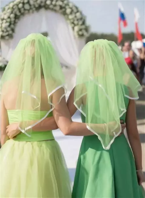 AI Video from prompt: two girls in lemon-green dresses and lemon-green