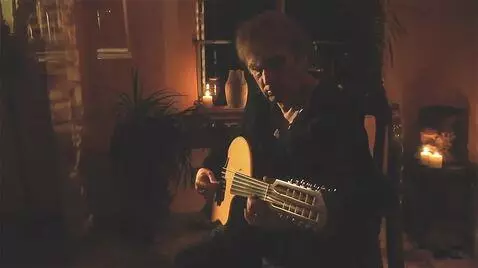 AI Video from prompt: he plays the oud a middle eastern instrument for