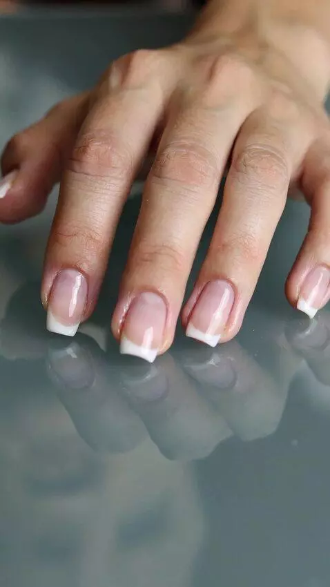 AI Video from prompt: Close-up. The frame shows a young woman's elegan