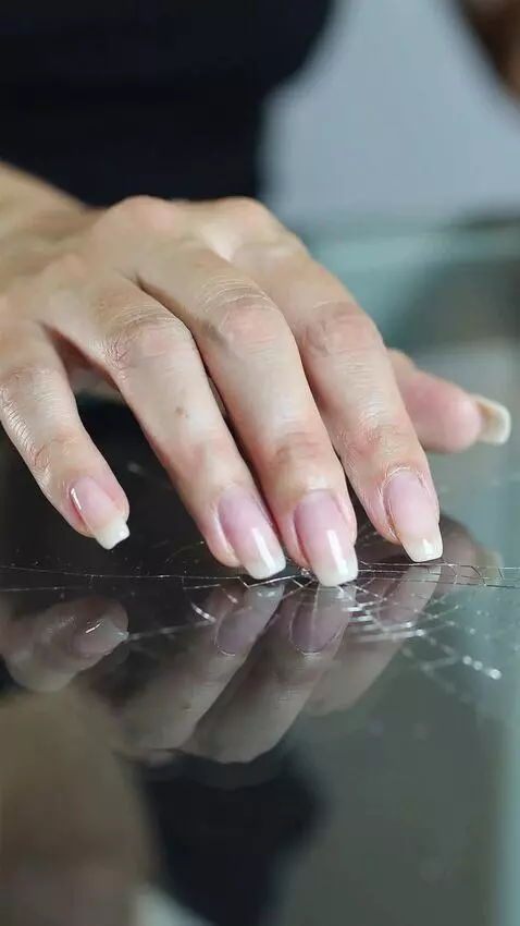 AI Video from prompt: Close-up. The frame shows a young woman's elegan