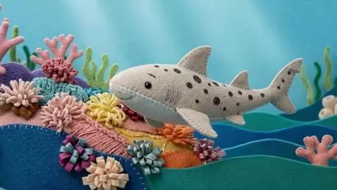 AI Video from prompt: 3D sewn-felt stop-motion style. The spotted Horn