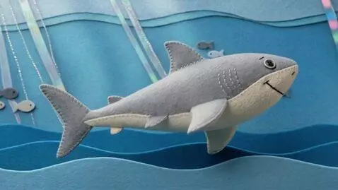 AI Video from prompt: 3D sewn-felt stop-motion style. The Great White 