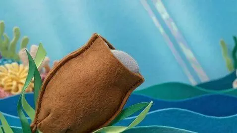 AI Video from prompt: 3D sewn-felt stop-motion style. The tiny felt sh