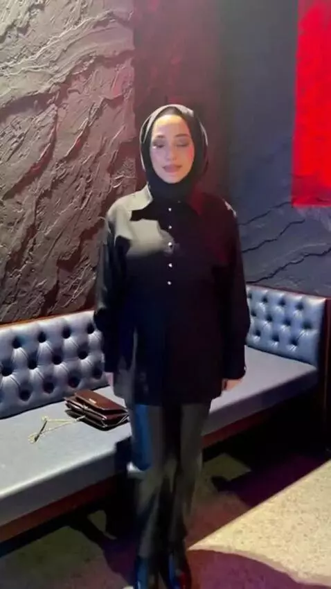 AI Video from prompt: she stand up start dance