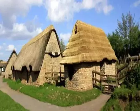 AI Video from prompt: medieval village at sunset from a distance of 30