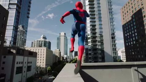 AI Video from prompt: spider man jump into building
