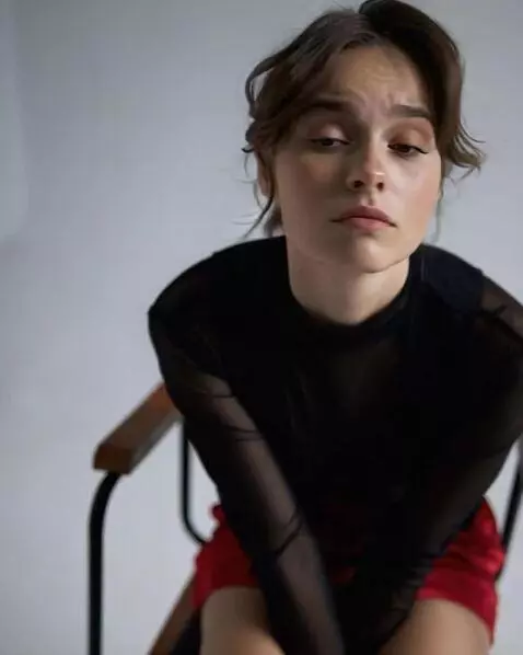 AI Video from prompt: the girl slowly turns her head straight and look