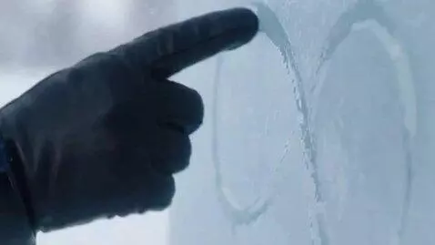 AI Video from prompt: an elderly seventy-year-old snow queen kisses a 