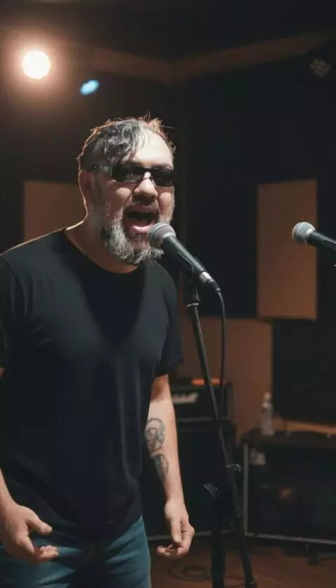 AI Video from prompt: A man with an exact replica of his face as in th