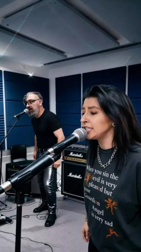 AI Video from prompt: A man in dark glasses, an exact replica of the f