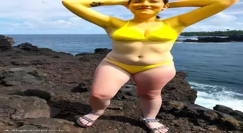 AI Video from prompt: Starts jumping up and down. Breasts jiggle and s