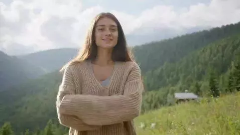 AI Video from prompt: The women arches her back. Her shirt slides off 