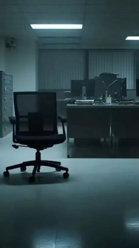 AI Video from prompt: CCTV room view, chair slowly moving, stopping su