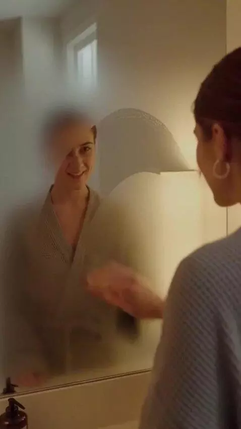 AI Video from prompt: A person is getting ready in front of a steamed-