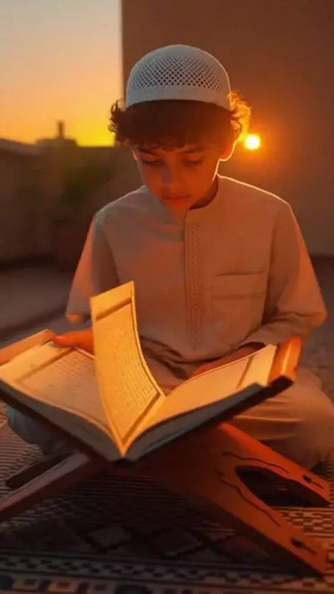 AI Video from prompt: A peaceful Ramadan scene, a young boy reading th